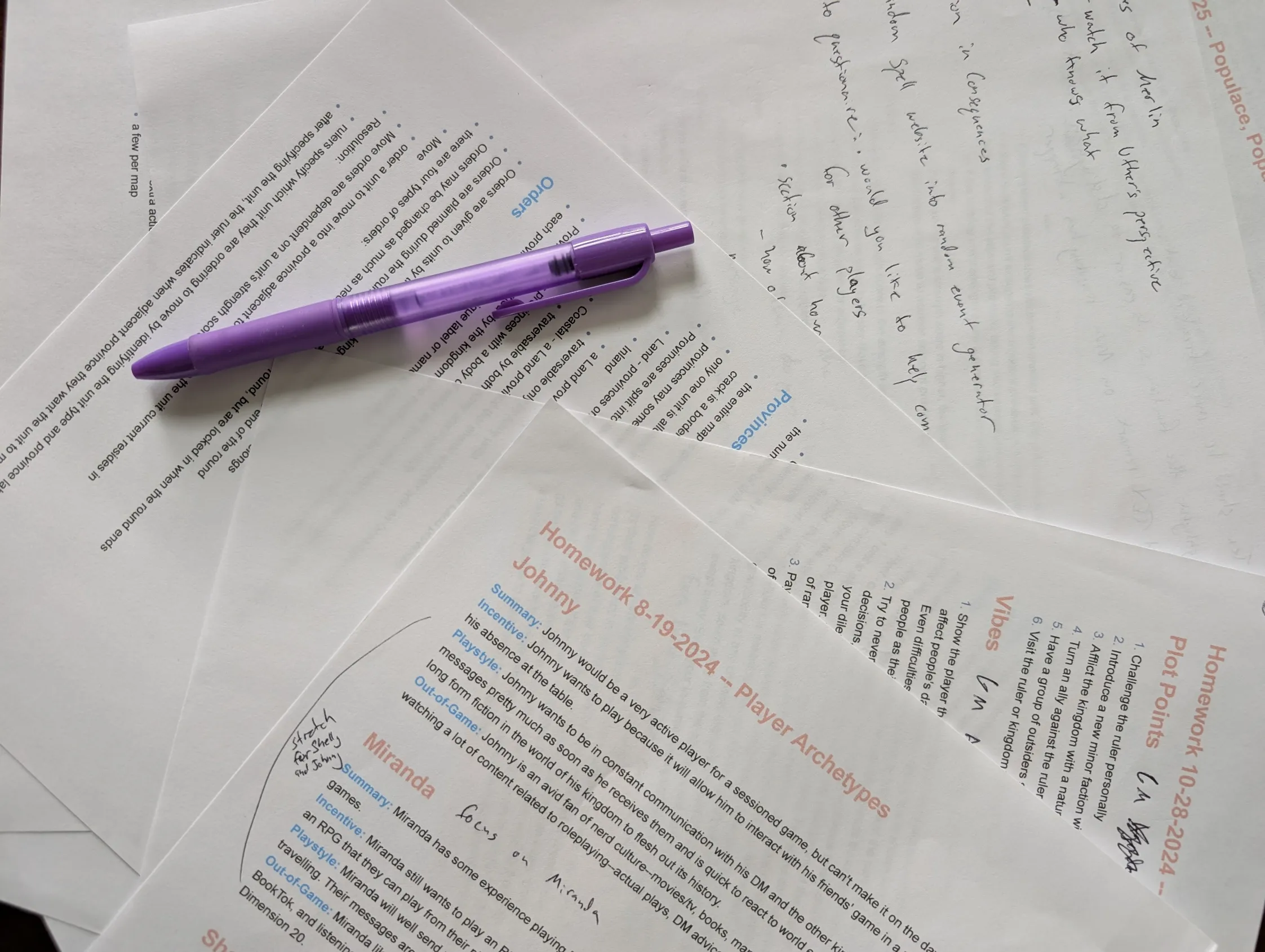 A pile of scattered papers and notes from the design of of Writ of Rulers.